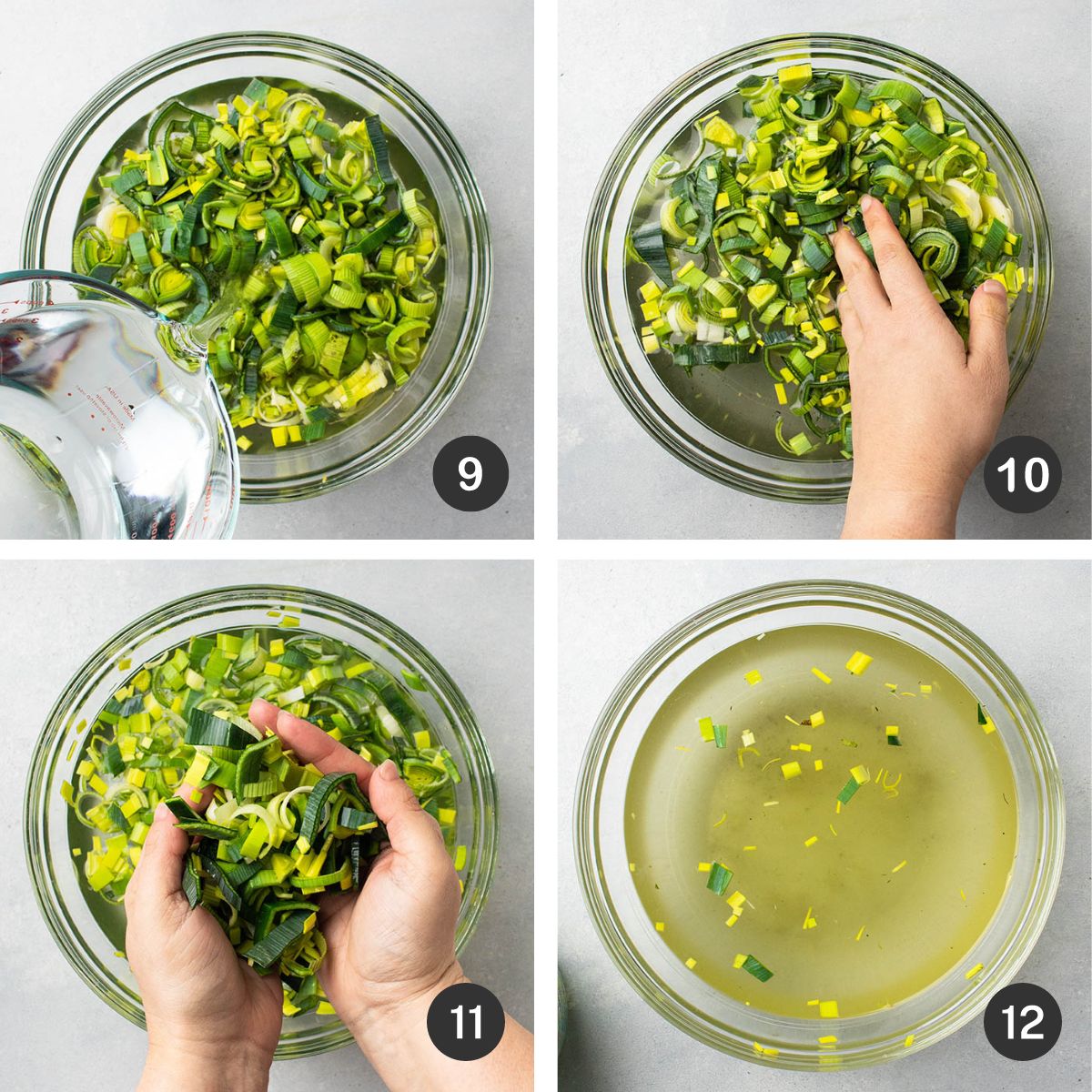 Washing sliced leeks in a large bowl of water.