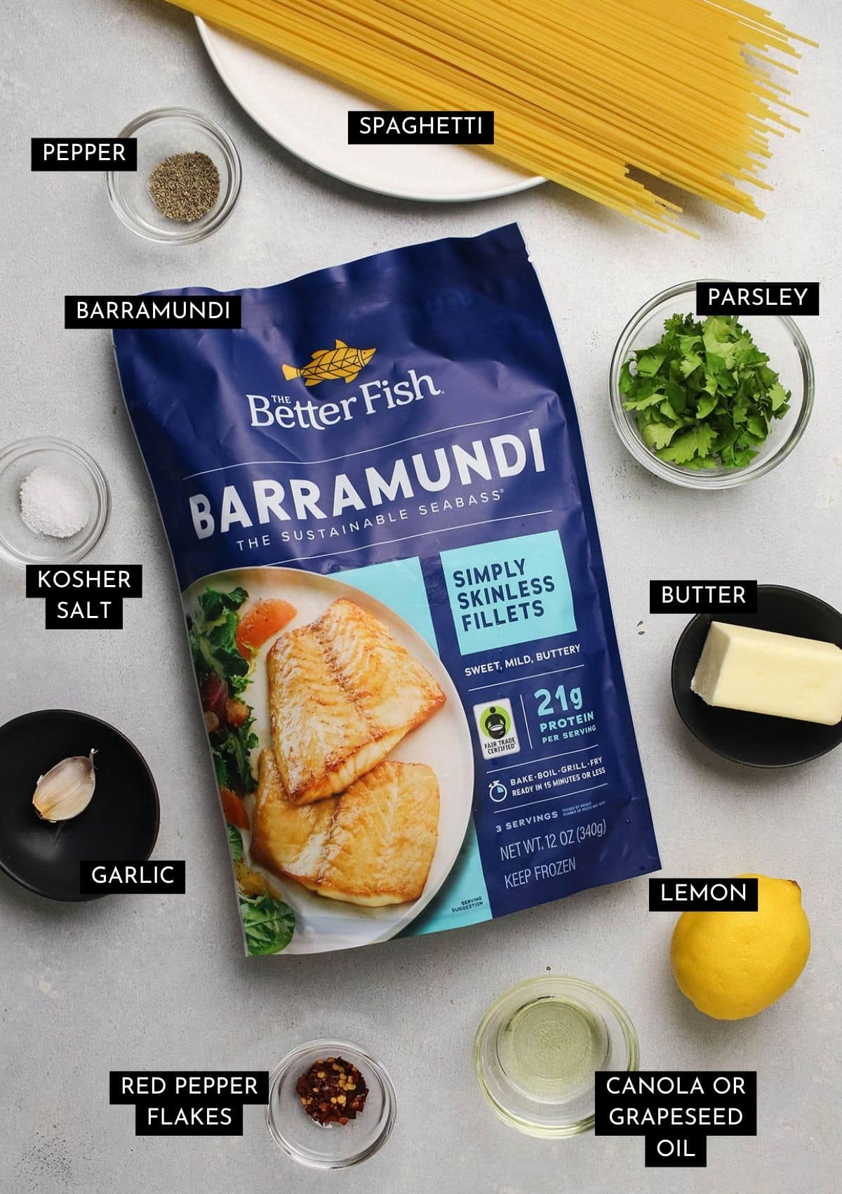 A bag of frozen barramundi fillets next to recipe ingredients measured into individual bowls.