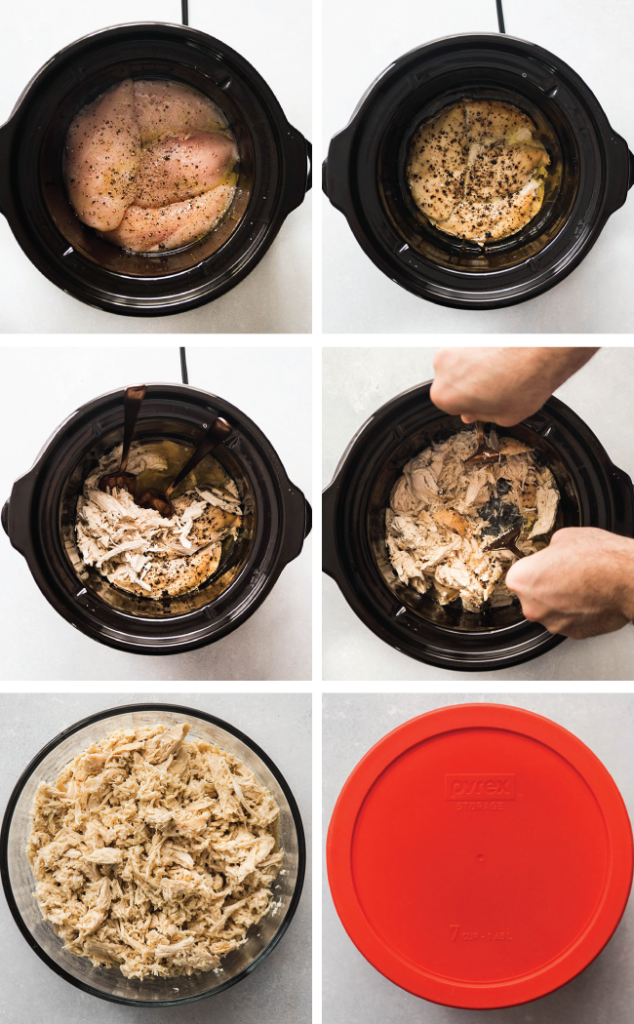 Man\'s hands shredding cooked chicken in the bowl of a black crock pot. 