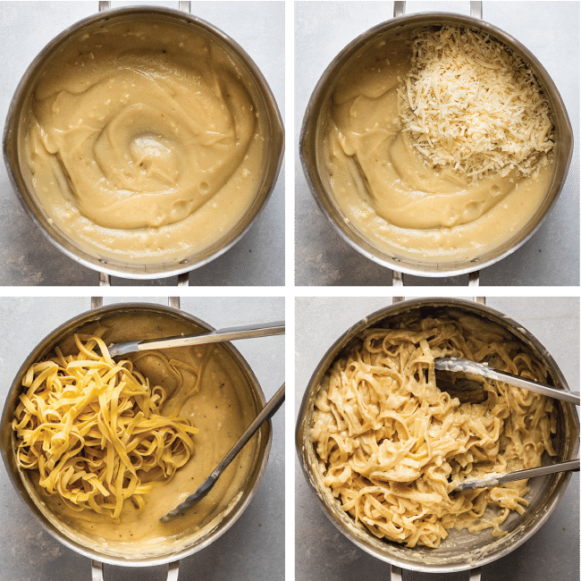 Grey tongs mixing fettuccine pasta with alfredo sauce in a large saucepan.