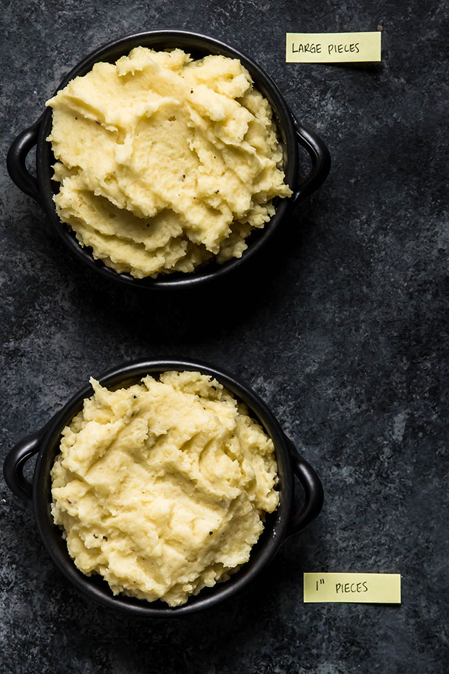 Two black bowls of identical-looking mashed potatoes on a black background, one labeled \'large pieces\' and one labeled \'small pieces.\'