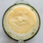 Glass blender filled with puréed cauliflower.