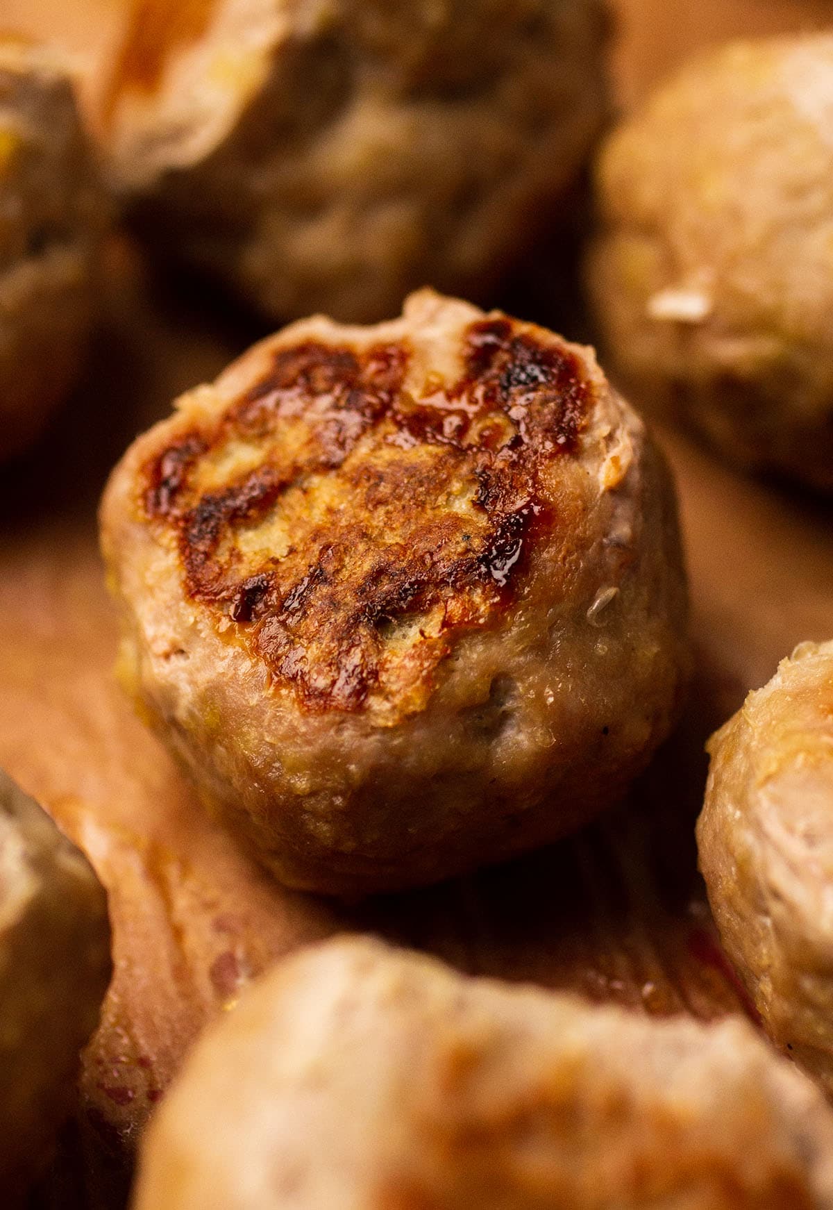 Close up of a baked turkey meatball.